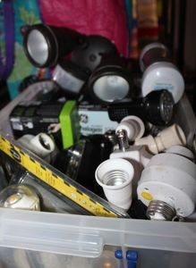 lot 207 image: Tote of Various Light Bulbs and other Lighting Accessories