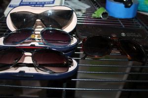 lot 211 image: Sun Glasses including Steve Madden and Sola