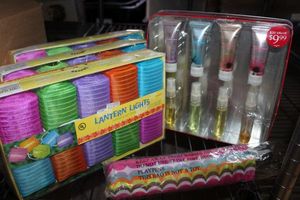 lot 223 image: New Items. Three (3) Sets of Lantern Lights, Lotion and Perfume Set and Umbrella