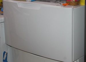 lot 275 image: White Pedestal for Washer with Contents