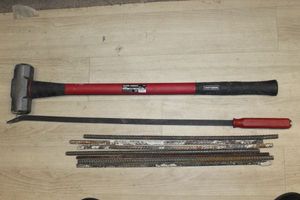lot 314 image: 8 pound craftsman Sledge Hammer, Craftsman Pry Bar and 7pcs of Rebar