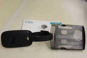 lot 439 image: Tile Luggage Tag and an Extra Battery