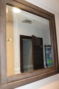 lot 461 image: Large Decorative Mirror Framed in thick Wood.. 40x40x1.5