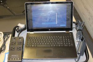 lot 450 image: HP Pabillion Laptop, bag and Buzz Bar
