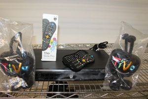 lot 519 image: Tivo Box, 2 Plush Logos, and 2 Remotes