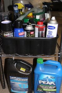 lot 295 image: Automotive Items Cleaning Chemicals Touch up Paint and more See Photos