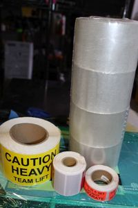 lot 353 image: Packing Tape, Heavy Team Lift Rolled Labels and Do not separate Rolled Labels