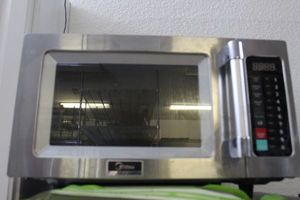 lot 358 image: Midea Microwave