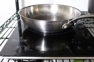 lot 391 image: Duxtop Induction Burner with Manual and Duxtop Stainless Steele Frying Pan