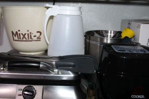 lot 393 image: Family sized Waffle Maker, Canister with Cooking Gadgets Steamer (never used) and Mixing Bowl