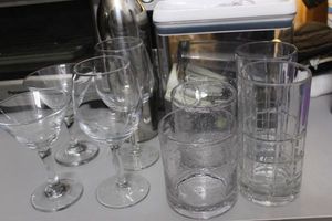 lot 398 image: Martini, Wine, Pilzner, and Old Fashioned Glasses, as well as a Cocktail Shaker and Electric Wine Bottle Opener