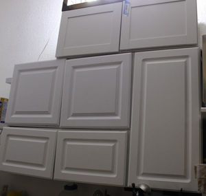 lot 402 image: Six Sets of Cabinets.. Pick-up needs to be scheduled, Buyer is responsible for removing from walls