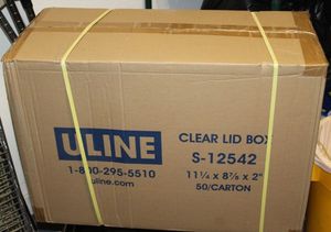 lot 539 image: One Full Case of Clear Lidded Boxes, 11 14x8 78x2