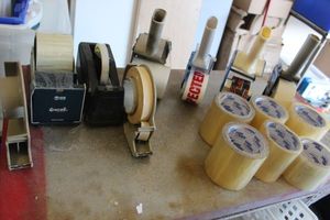 lot 601 image: Tape Gun of various sizes and extra Tape