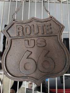 lot 607 image: Cast Iron Rt 66 Sign