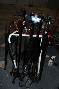 lot 564 image: Health Aides, Walker, 3 Canes, Bedrail and Knee Scooter, and Traction Tape