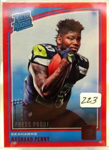 lot 223 image: 2018 Donruss Press Proof Red 318 Rashaad Penny RATED ROOKIE