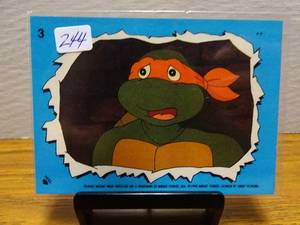 lot 244 image: 1990 Topps Teenage Mutant Ninja Turtles Sticker #3 TMNT 2nd Series