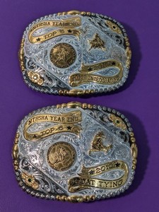 lot 36 image: Lot of 2 - 2010 Top 6 - Goat Tying & Steer Undercorating - Gist Belt Buckle
