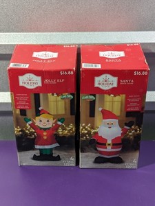 lot 81 image: Lot of 2 - Holiday Inflatable Jolly Elf & Santa