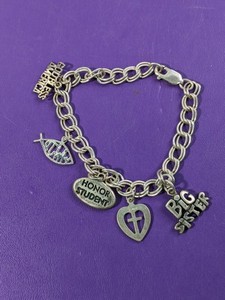 lot 148 image: Sterling Silver Bracelet w Sterling Charms - 18.6grams