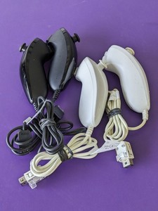 lot 216 image: Lot of 4 - Nintendo Wii NunChucks