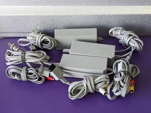 lot 219 image: Lot of 3 - Nintendo Wii Power Supply, Video Cable