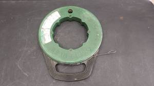 lot 32 image: Greenlee Model 438-20 Steel Fish Tape, 200