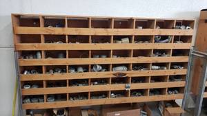 lot 157 image: Contents of Wooden Shelf ONLY  Includes Everything in the 48-Bin Organizer.  Wooden Shelf NOT INCLUDED