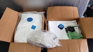 lot 206 image: Large Lot of Tyvek Coveralls, Hoods & Gloves