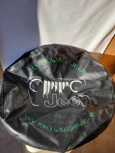 lot 7 image: JEEP WRANGLER SPARE TIRE COVER (FITS 2018-2021)