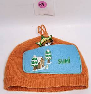 lot 89 image: KOOTENAY KNITTING COMPANY LTD - SUMI - VANCOUVER 2010 BEANIE WITH SMAILL PLUSH ATTACHED