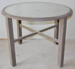 lot 60 image: 24 ROUND OUTDOOR GLASS TABLE