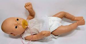lot 163 image: JESMAR ANATOMICALLY CORRECT DOLL WITH ORIGINAL HOSPITAL GOWN AND BELLY BUTTON GAUZE