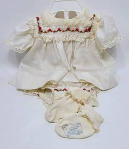 lot 164 image: VINTAGE ALEXIS BABY DRESS WITH WATERPROOF BLOOMERS  JC PENNY SOCKS