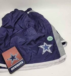 lot 197 image: COWBOYS SHORTS SIZE LARGE AND POWER BANK