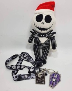 lot 220 image: NIGHTMARE BEFORE CHRISTMAS LOT - JACK SKELLINGTON PLUSH  2 KEYCHAINS AND A LANYARD