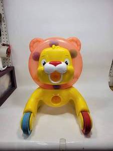 lot 254 image: KIDS RIDE-ON LION