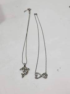 lot 260 image: DOLPHIN & INFINITY CHARM NECKLACE