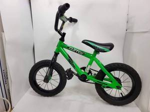 lot 134 image: NEON GREEN KIDS CLUTCH BIKE
