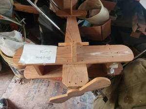 lot 241 image: Large wood airplane swing with rope