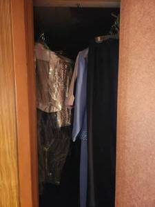 lot 220 image: All the clothes in closet but not any other items (lots of clothes) - some still with tags