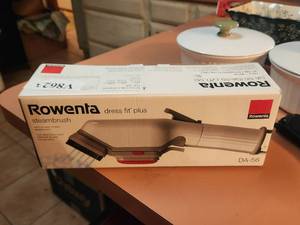 lot 162 image: Rowenta steambrush