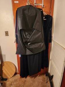 lot 147 image: Contents of clothes hanging on back of door