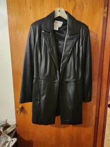 lot 136 image: Black Leather jacket by Pamela McCoy - S