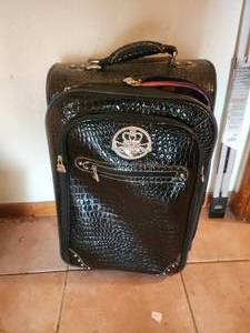 lot 122 image: Suitcase by Kathy Van Zeeland