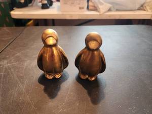 lot 80 image: Pair of solid brass penguins