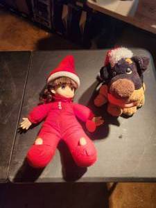 lot 72 image: Collectible doll-elf by precious moments and a stuffed dog