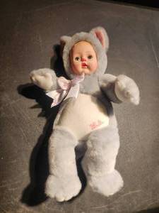 lot 68 image: Hug Me Kitty - collectible bear with baby face
