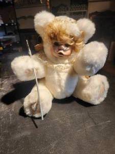 lot 64 image: Vintage collectible teddy bear with baby face and wings